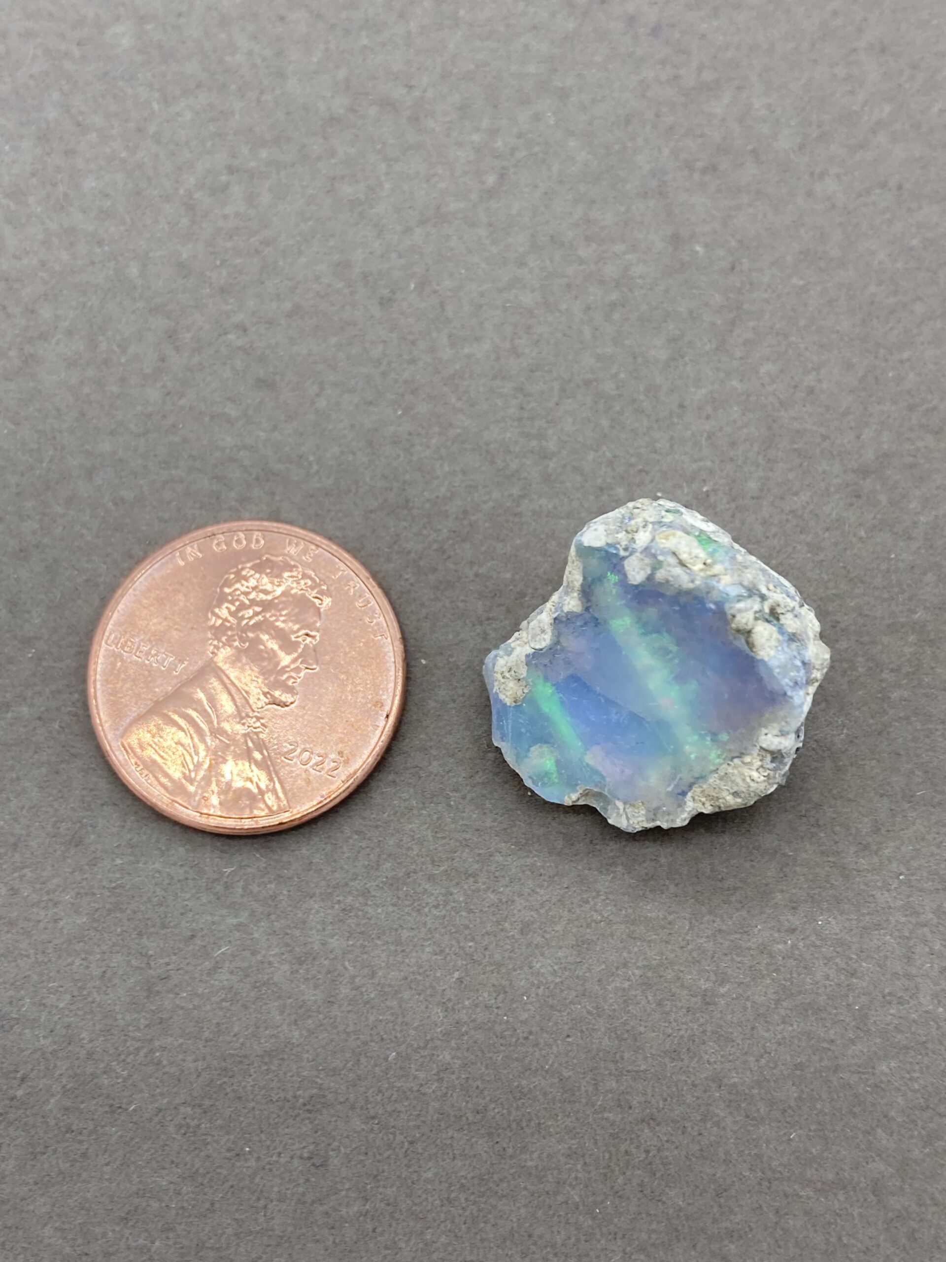 Opal with penny