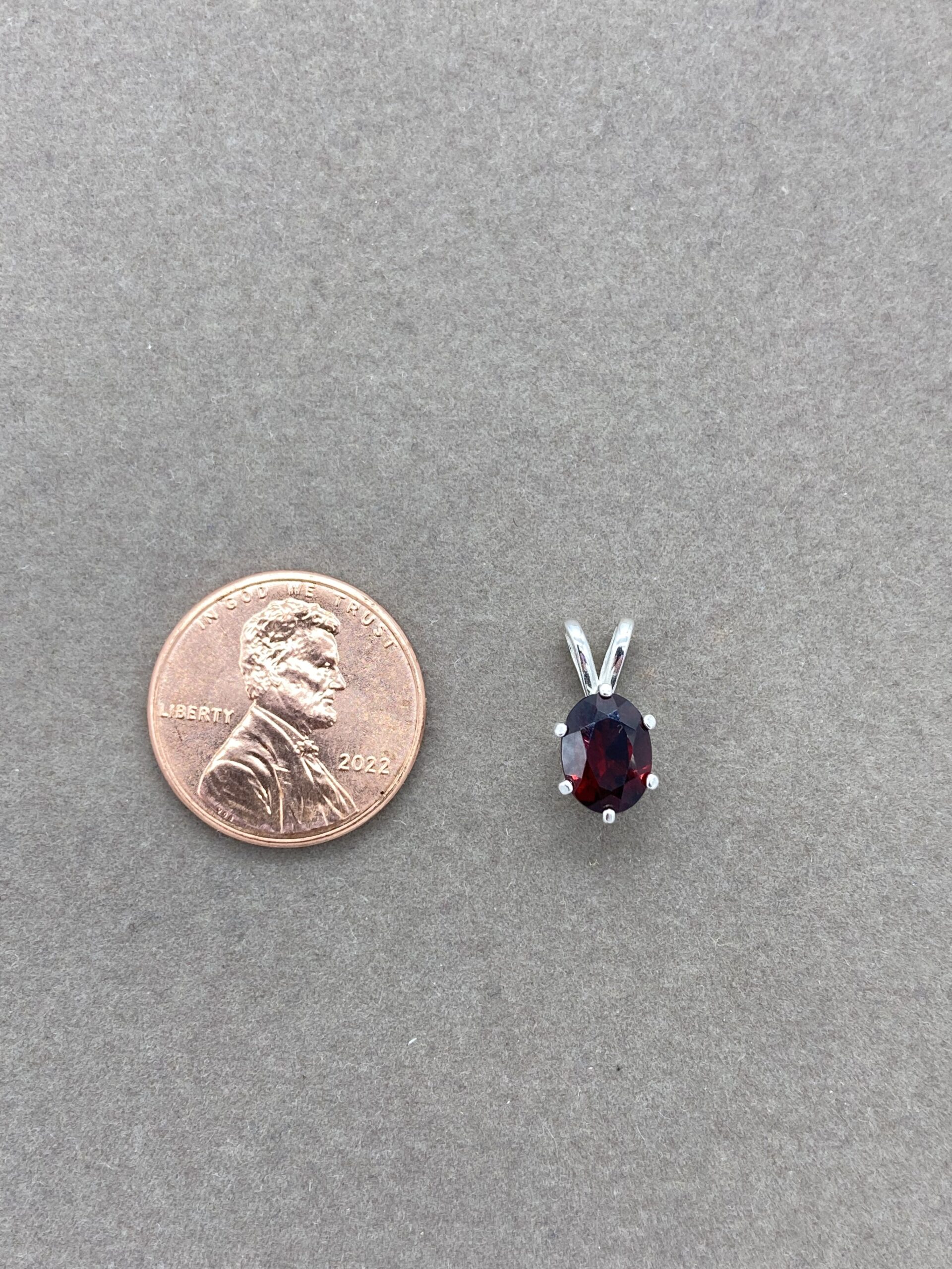 Garnet pendant with penny