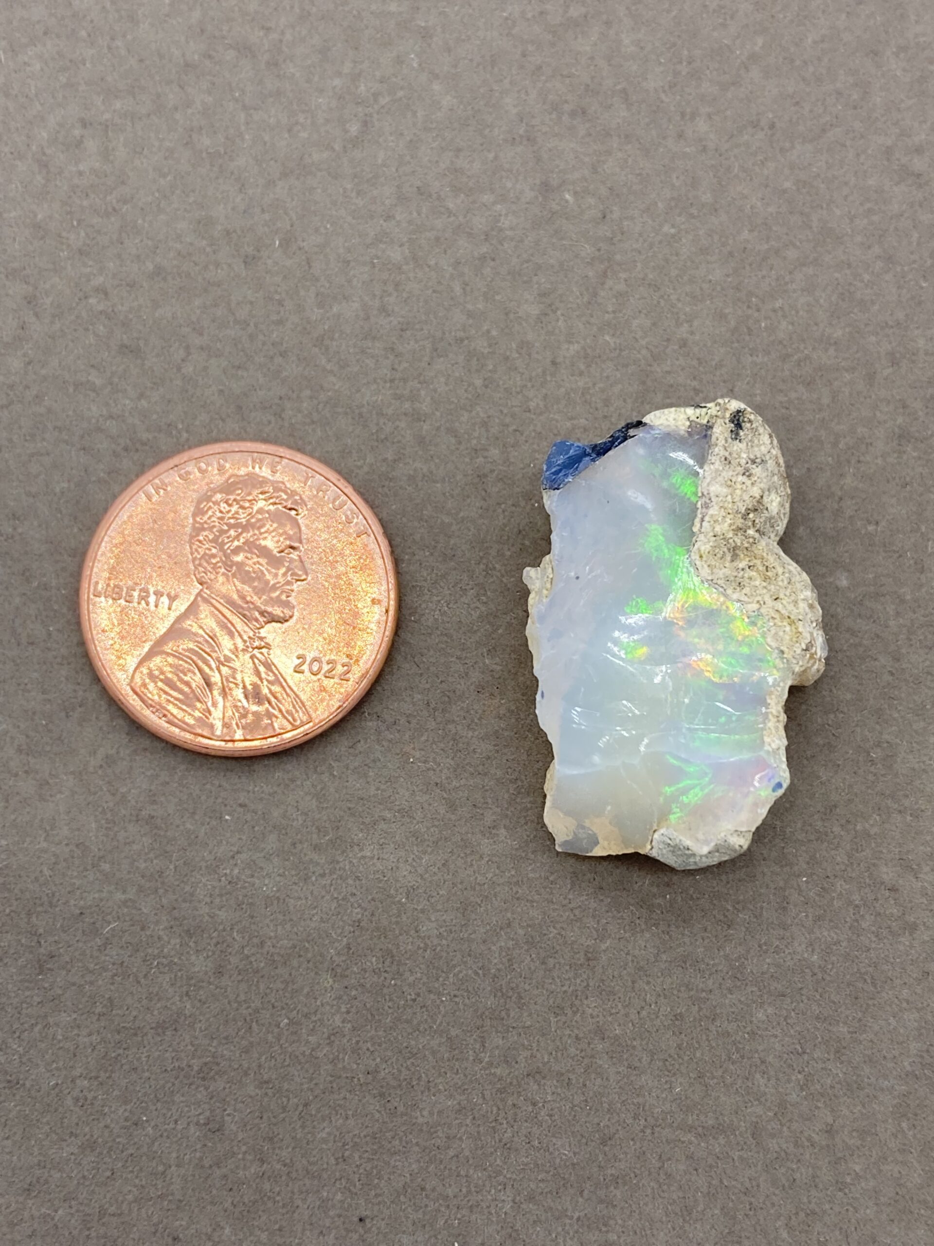 Opal with penny